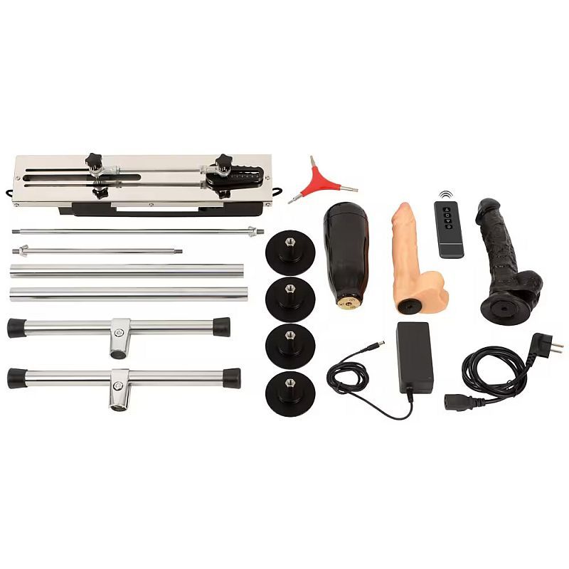 A disassembled dual-ended sex machine kit with metal frame parts, dildos, and a remote control.