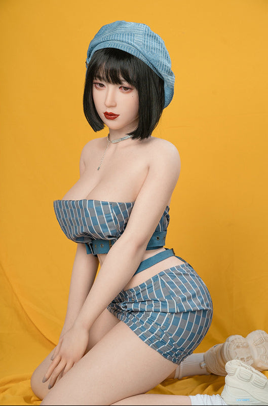 love doll sex toy wearing a blue denim outfit with a matching hat against an orange background