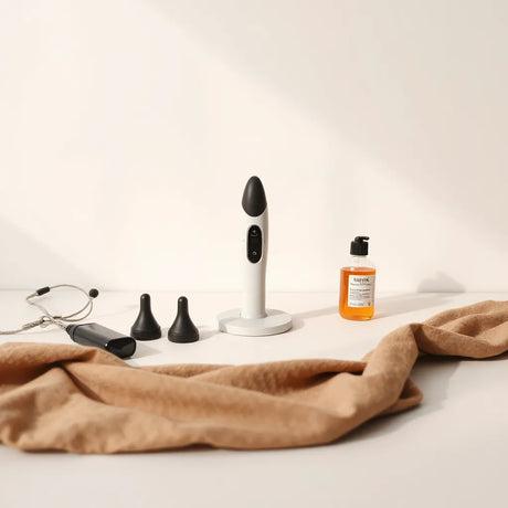 A sex machine device on a clean background with visible adjustable parts and accessories.