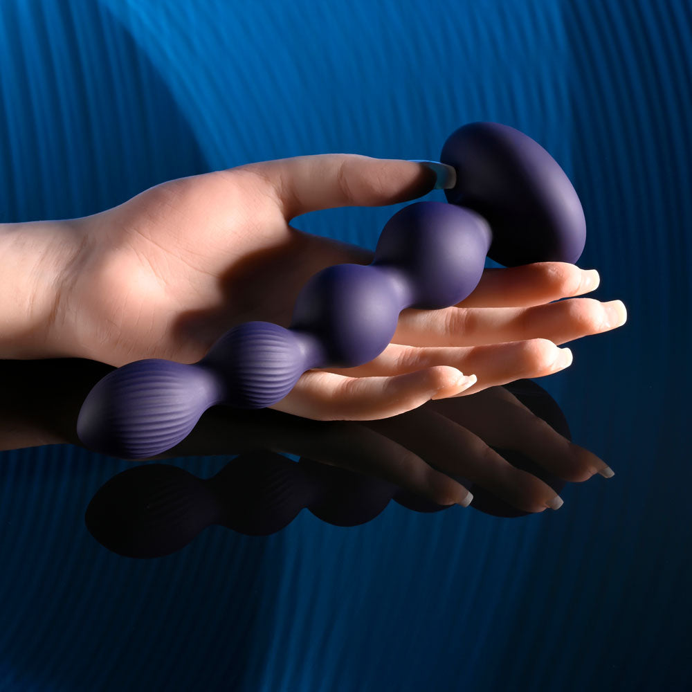 Evolved PLEASURE ORBIT - Navy Blue 17.8 cm USB Rechargeable Twirling & Vibrating Anal Beads with Remote - Naughty by Nature Adult Store