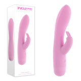 Evolved Cushy Bunny pink USB rechargeable rabbit vibrator shown next to its product packaging.