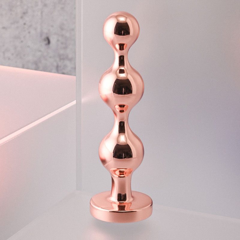 Gender X GOLD DIGGER SMALL - Rose Gold Small Butt Plug with Black Gem Base - Naughty by Nature Adult Store