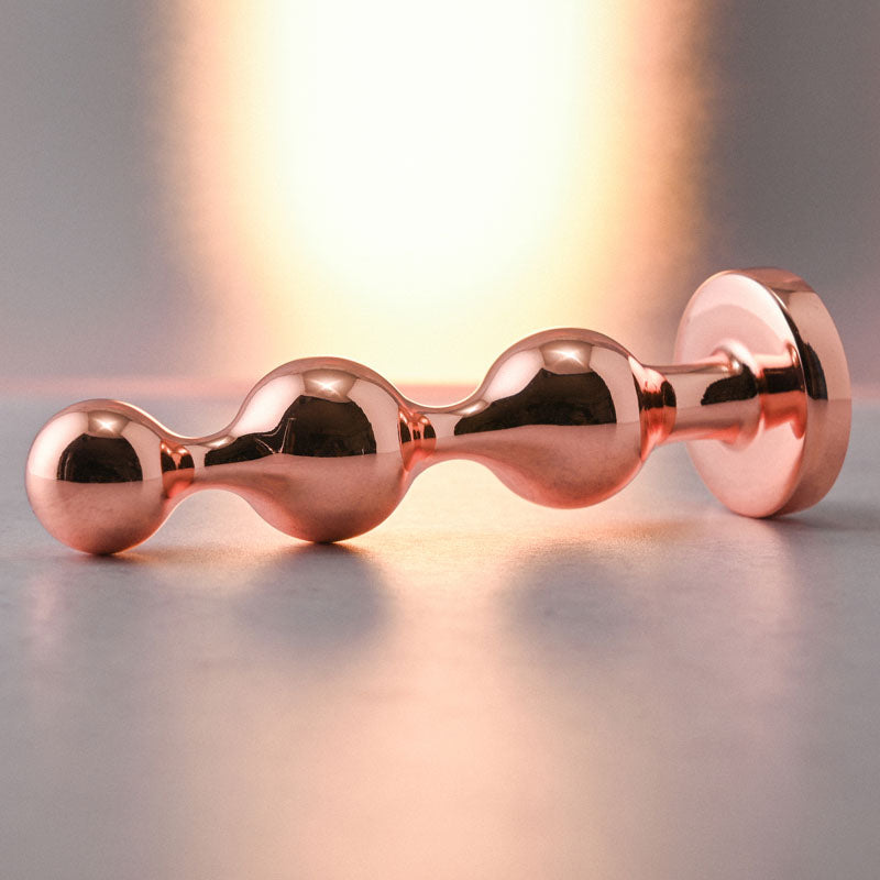 Gender X GOLD DIGGER SMALL - Rose Gold Small Butt Plug with Black Gem Base - Naughty by Nature Adult Store