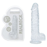 Clear silicone dildo with packaging labeled 'Real Rock' on a white background