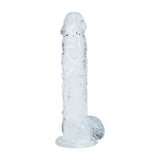 Clear silicone dildo on a white background