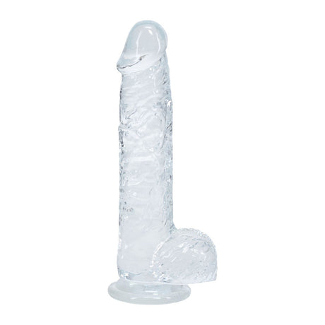 Clear silicone butt plug on a white background