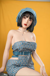sex doll wearing a blue striped dress and hat against an orange background